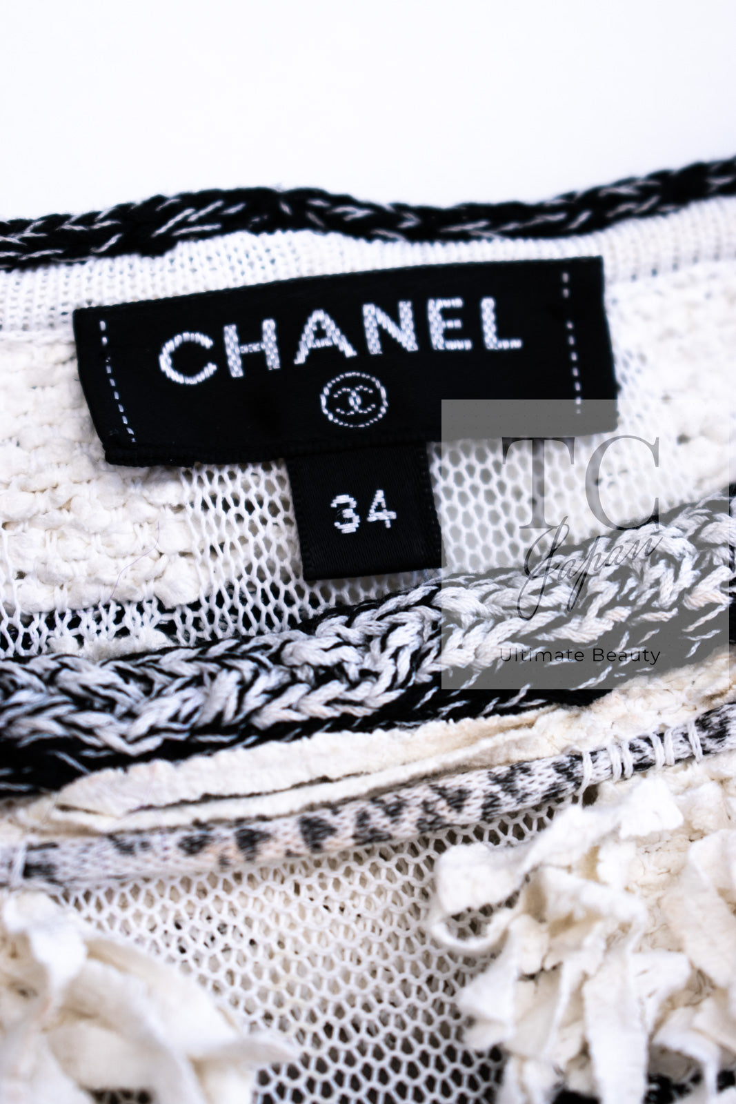 CHANEL 18P Ivory Black Logo Ribbon Fringe CC Mini Dress Tops 34 シャネル アイボリー ブラック ロゴ リボン フリンジ CC ミニ ワンピース トップス 即発