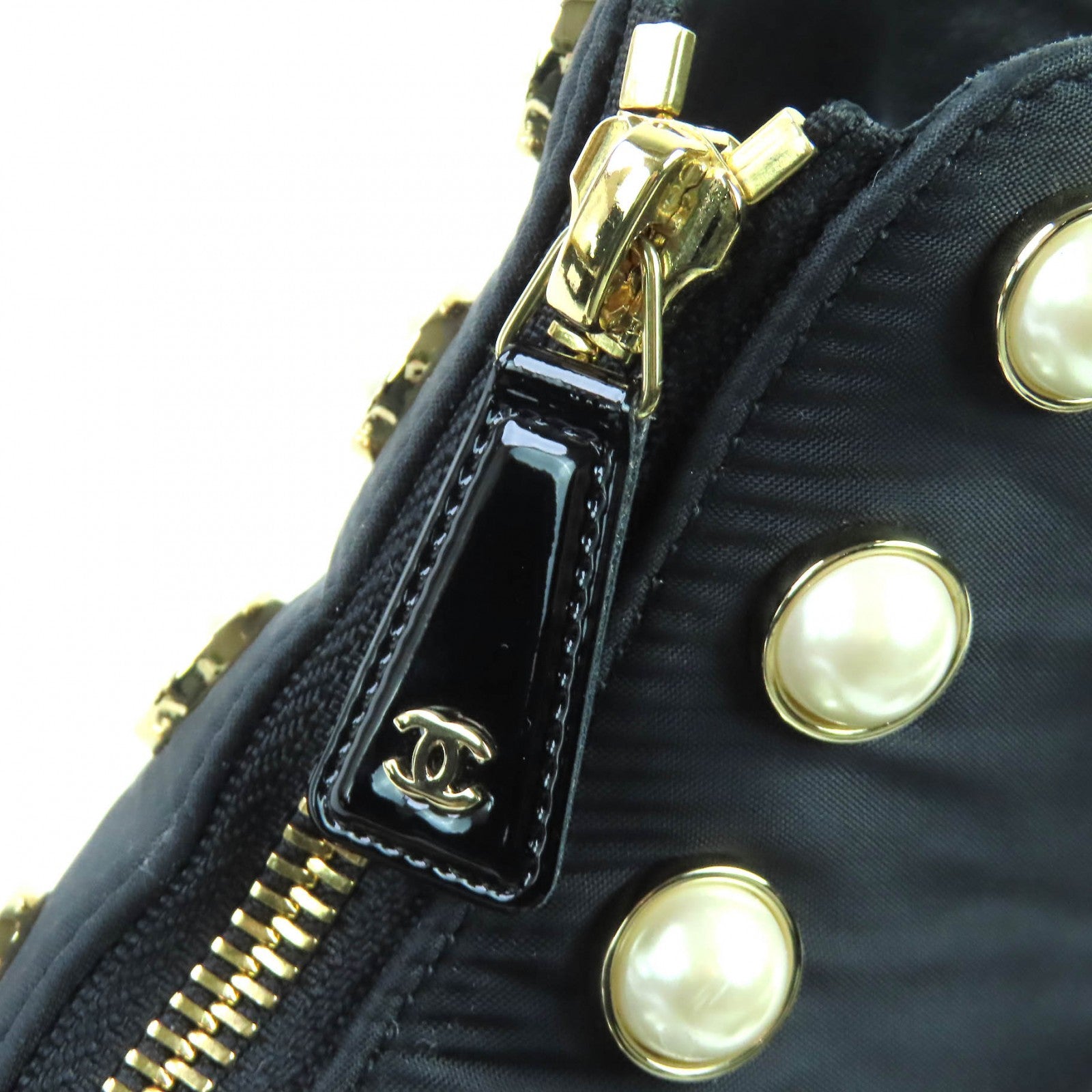 CHANEL Black short boots Women COCO Mark pearl front zip patent