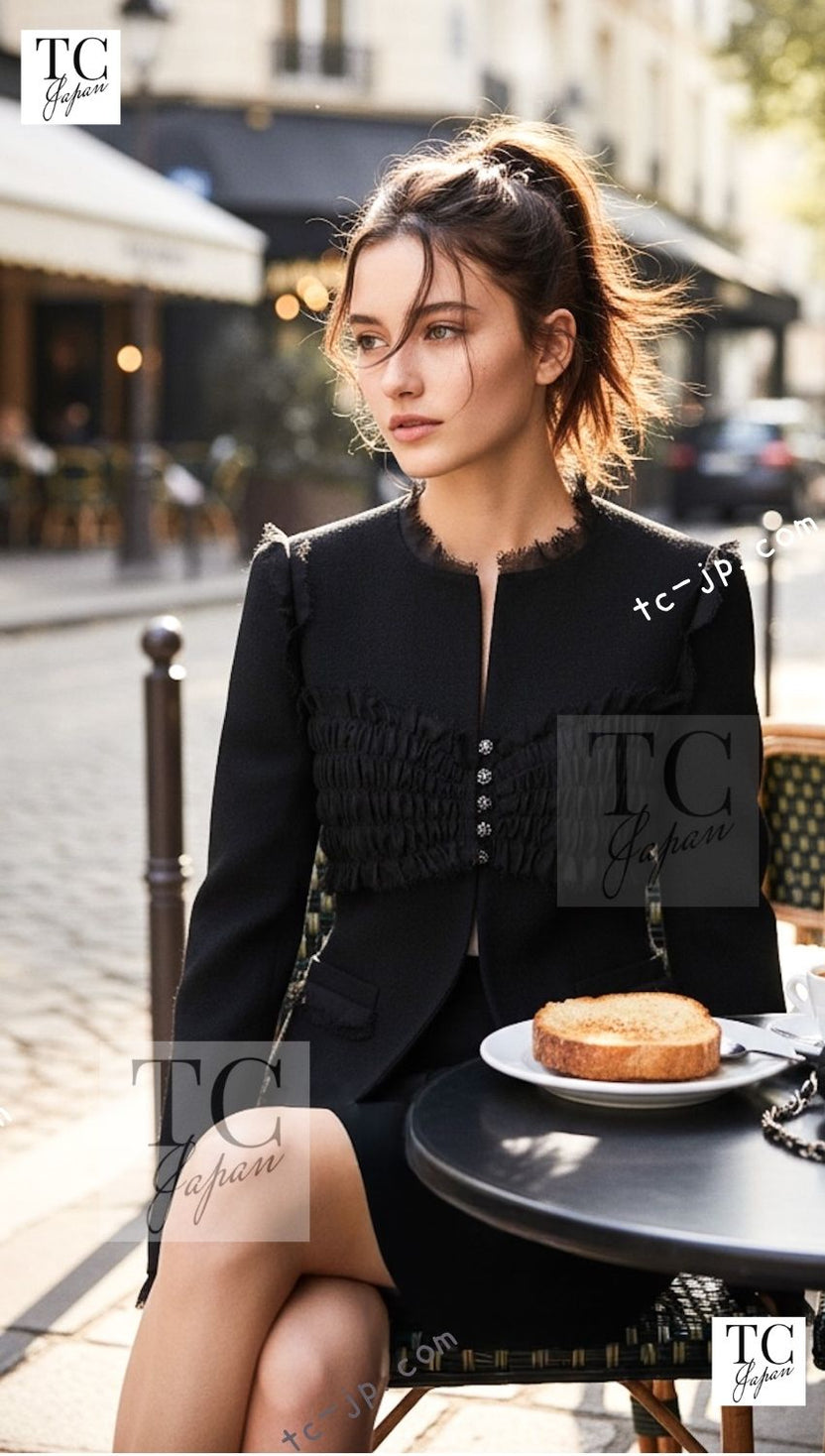CHANEL 04S black CC-button wool jacket model look