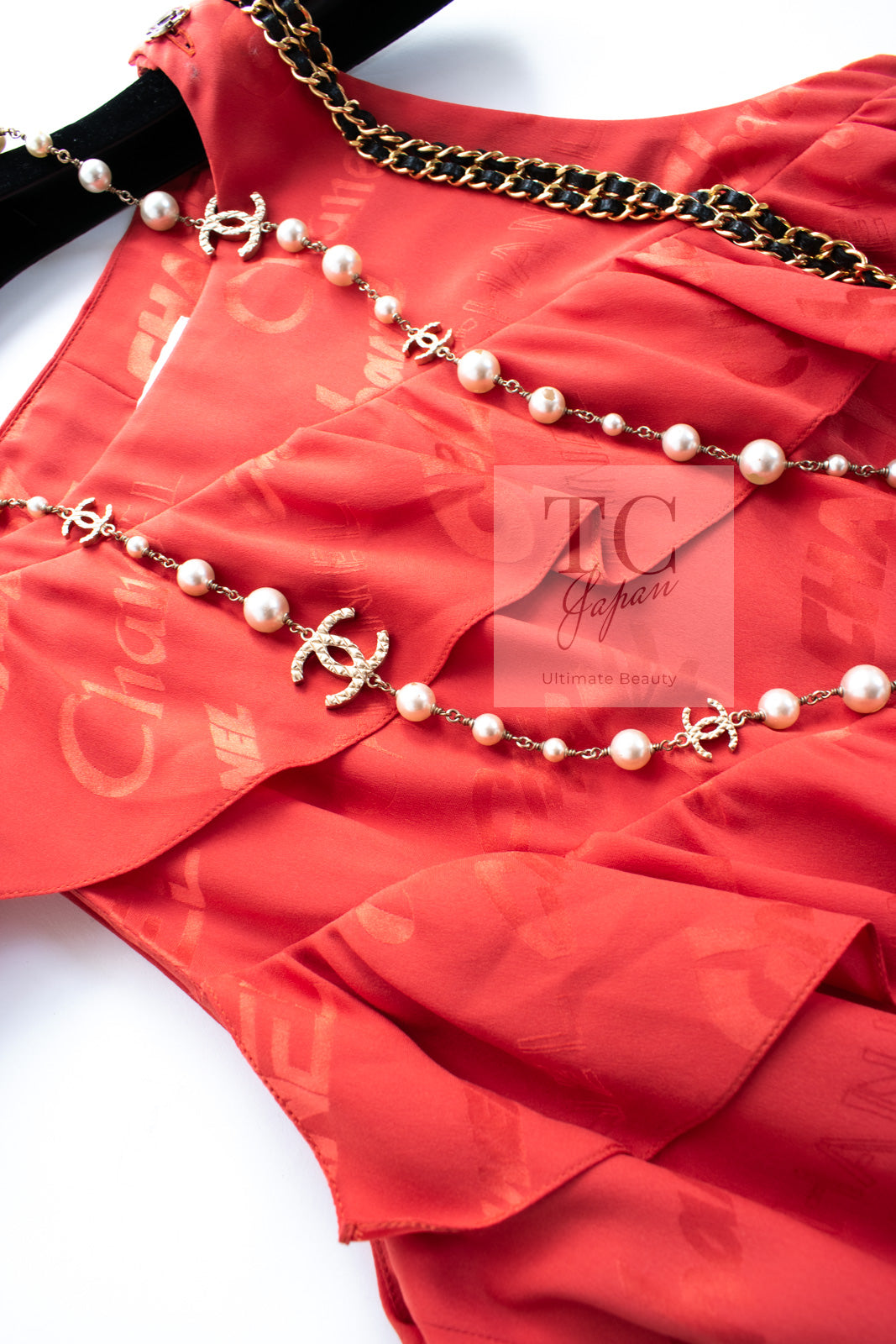 シャネル ワンピース CHANEL オレンジ シグネチャー ロゴ柄 シルク100