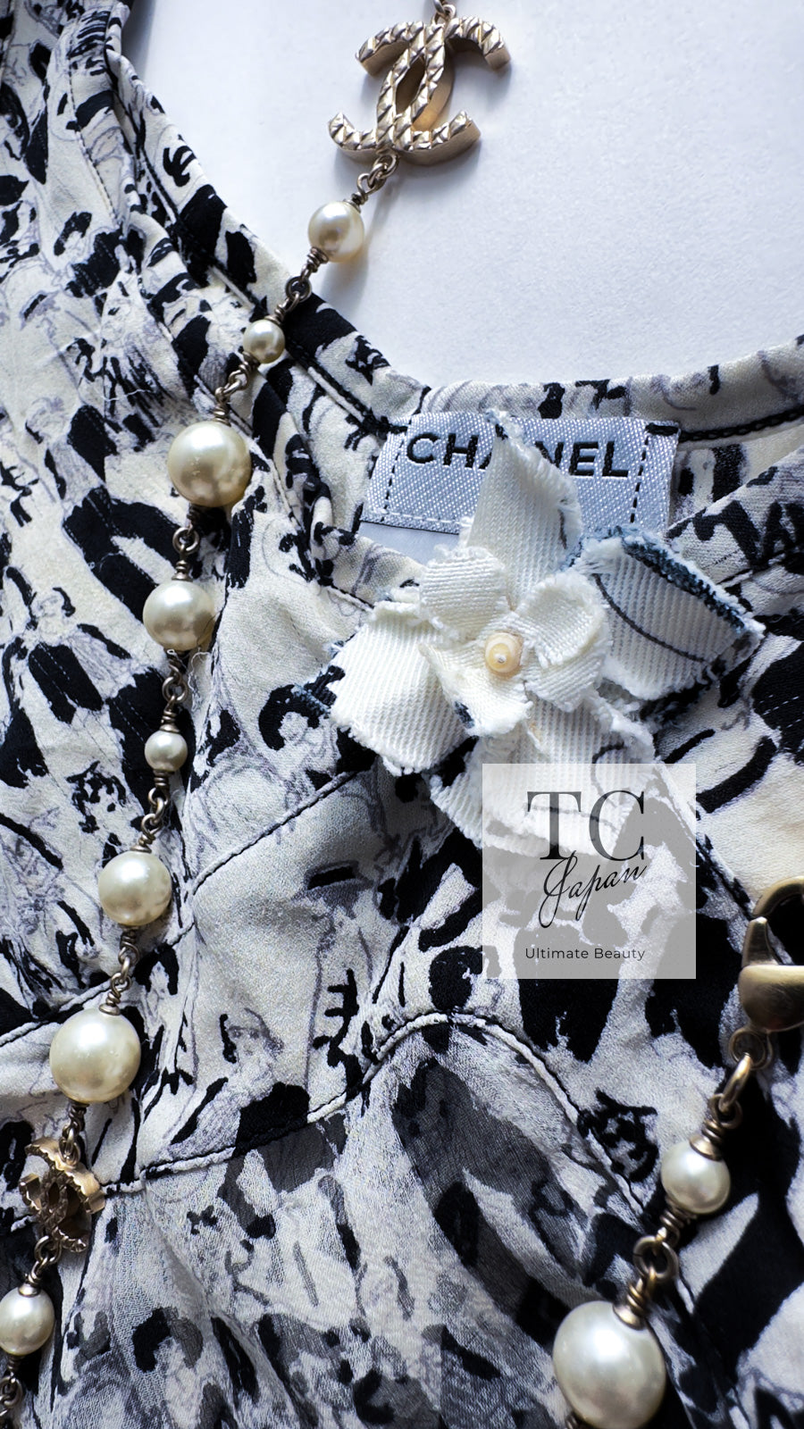 シャネルCHANEL シルクフロントプリーツ比翼シャツ クリーム38
